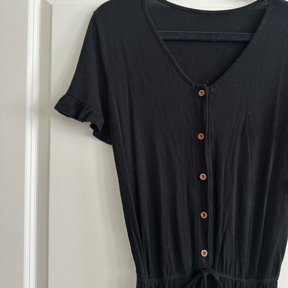 Women’s small black ruffle sleeve romper